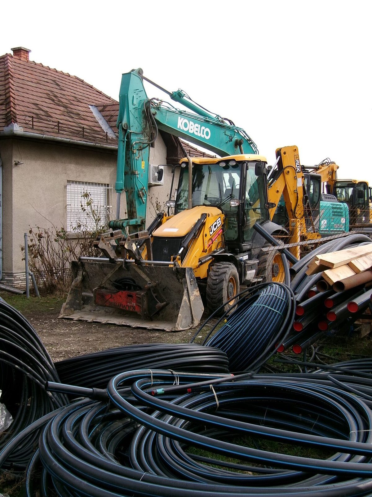 Гусеничный Экскаватор Kobelco SK210, б/у